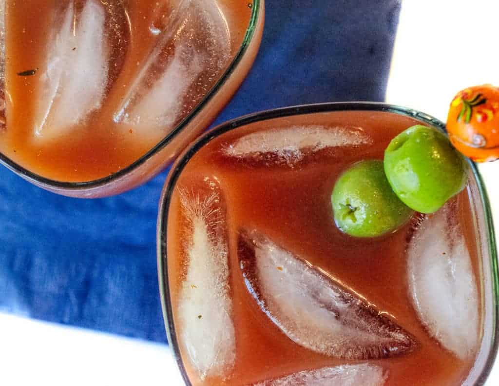 bloody mary with ice cubes and olives