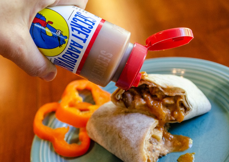 secret aardvark pouring onto a burrito