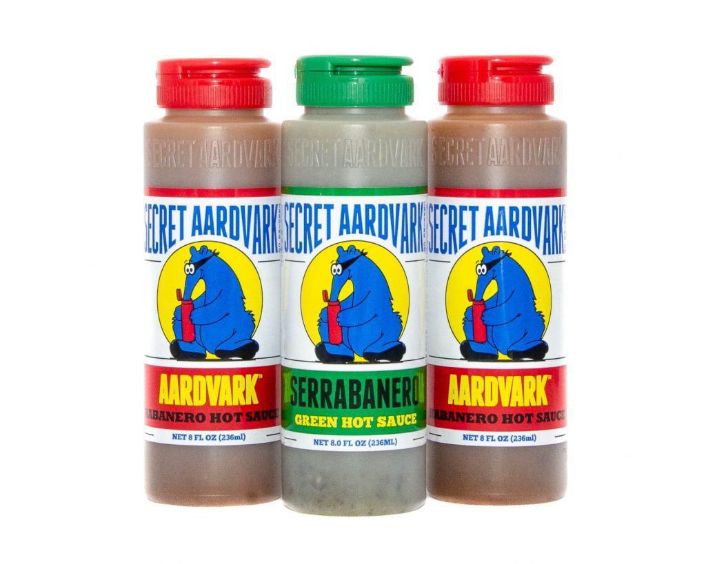 Bottles of Secret Aardvark sauces (Aardvark Habanero and Serrabanero)