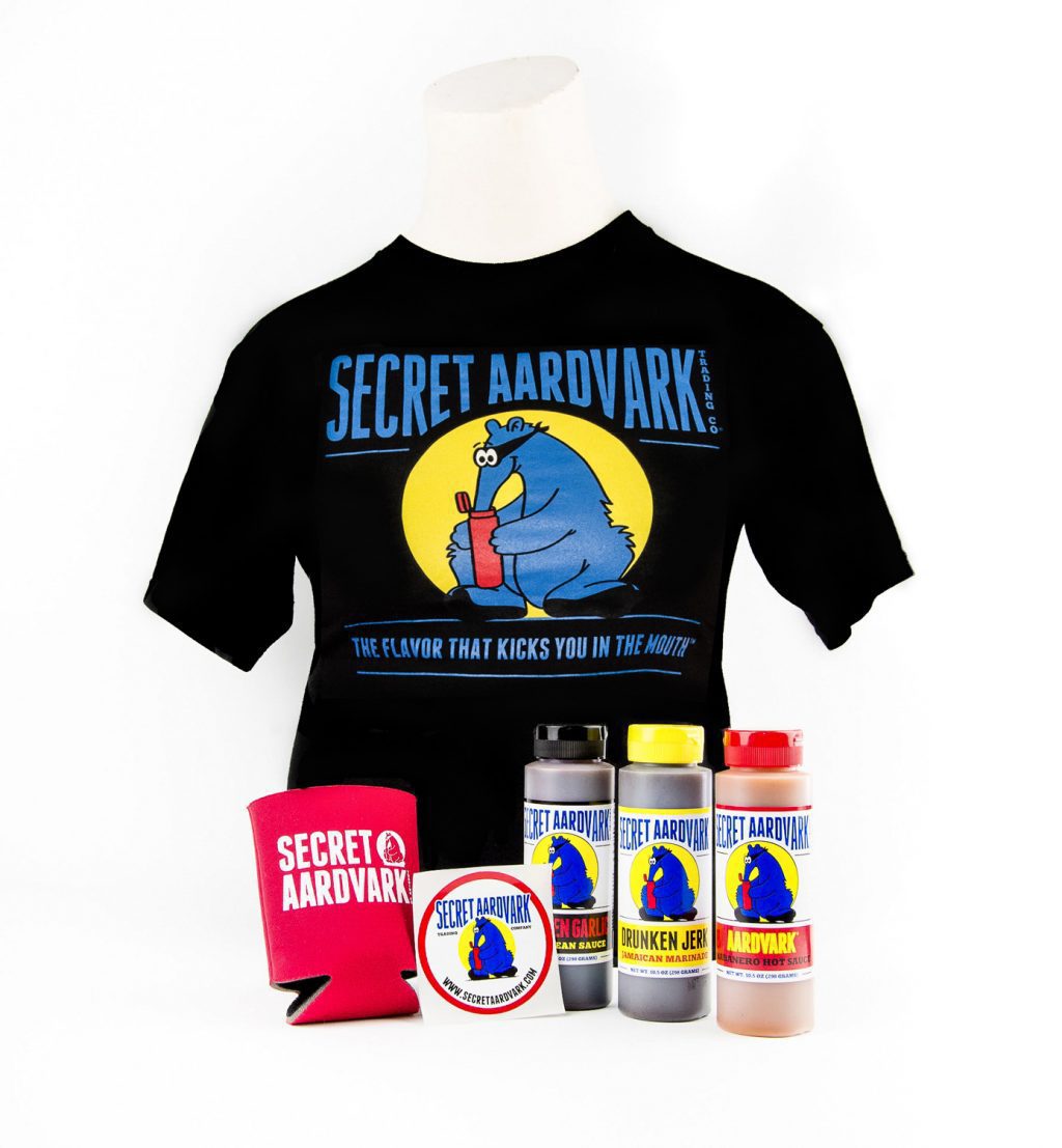 Black secret aardvark t-shirt, red koozie, secret aardvark sticker, bottles of secret aardvark sauce