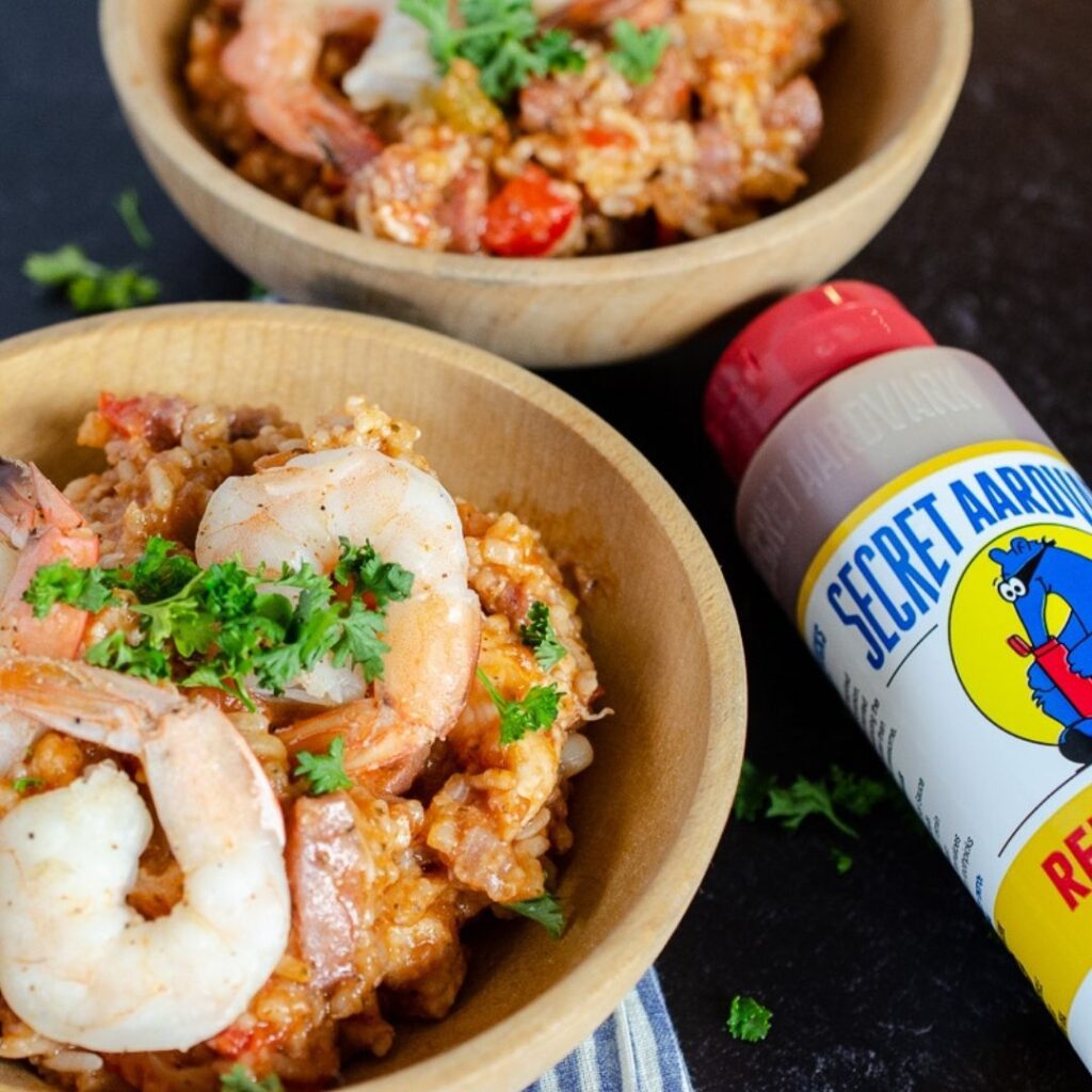 Jambalaya dish with Secret Aardvark Red Scorpion Hot Sauce bottle