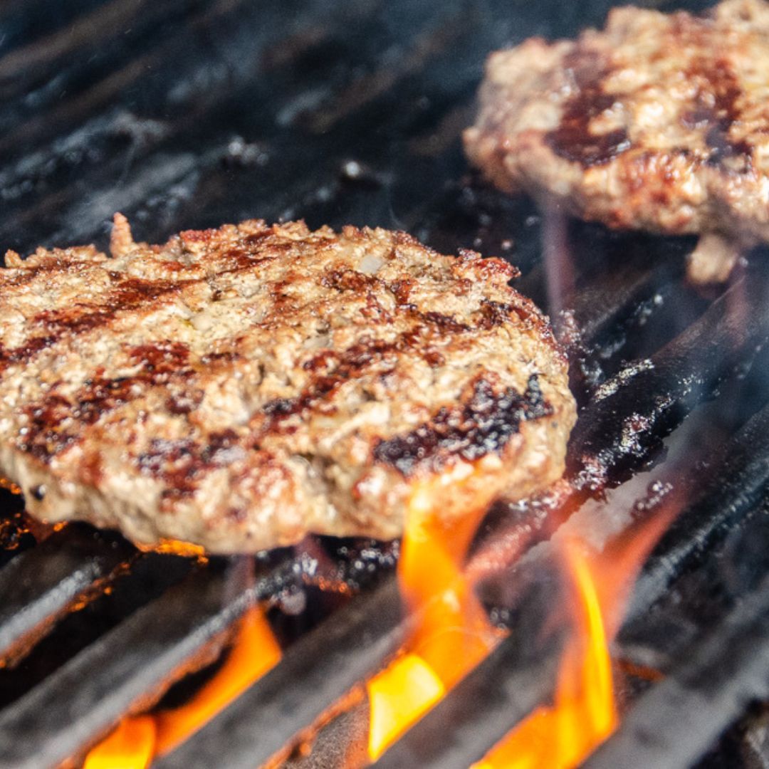 Sizzling Burger Patties on the Grill