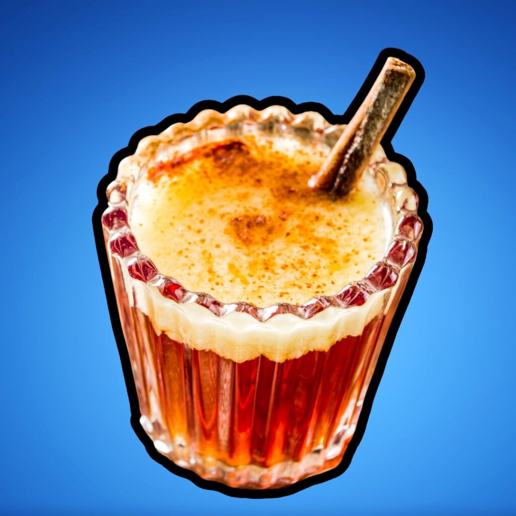 A cartoon of a cup of hot buttered rum 