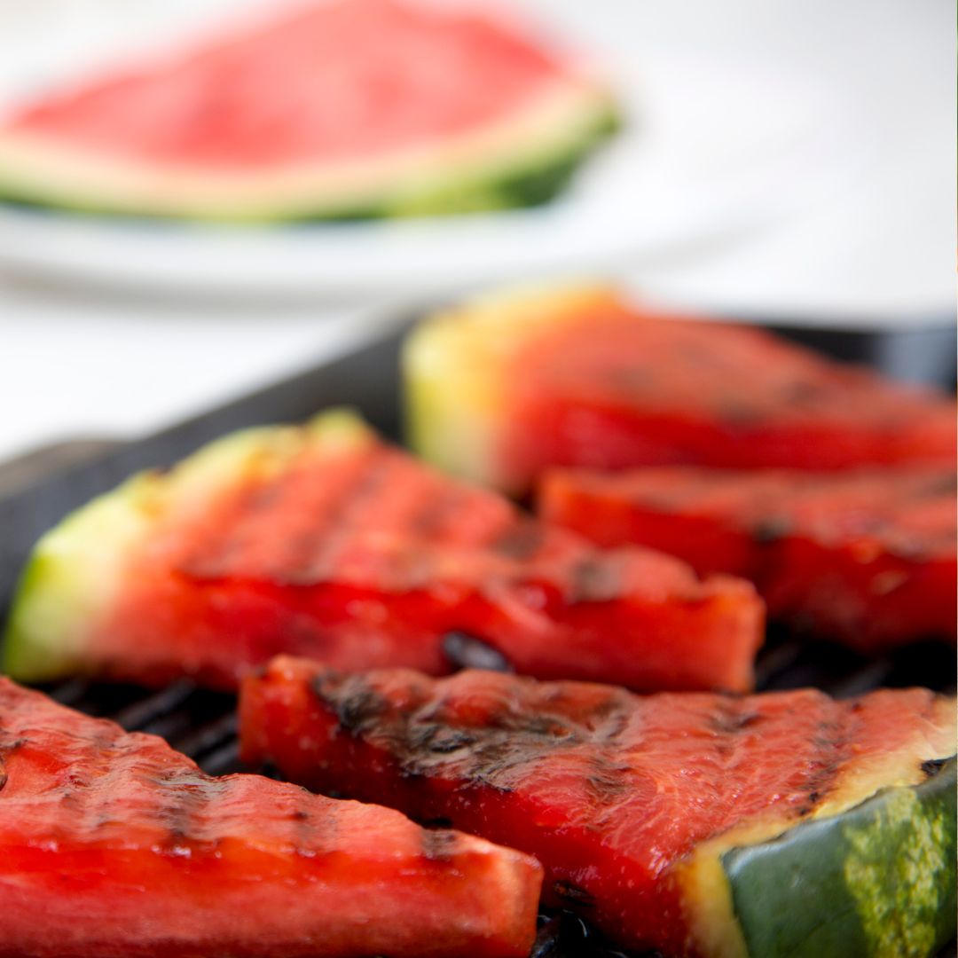 A photo of several slices of grilled watermelon