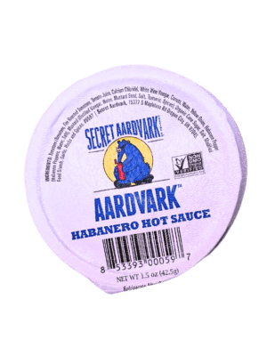 1.5 oz cup of Aardvark Habanero dipping up