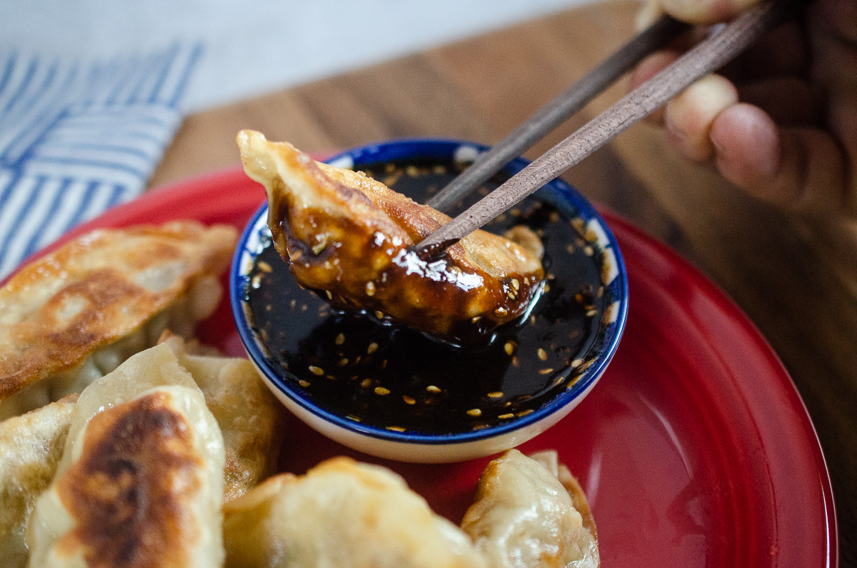 A delicious looking dumpling slathered in Aardvark's Garlic Black Bean Dumplin' Sauce