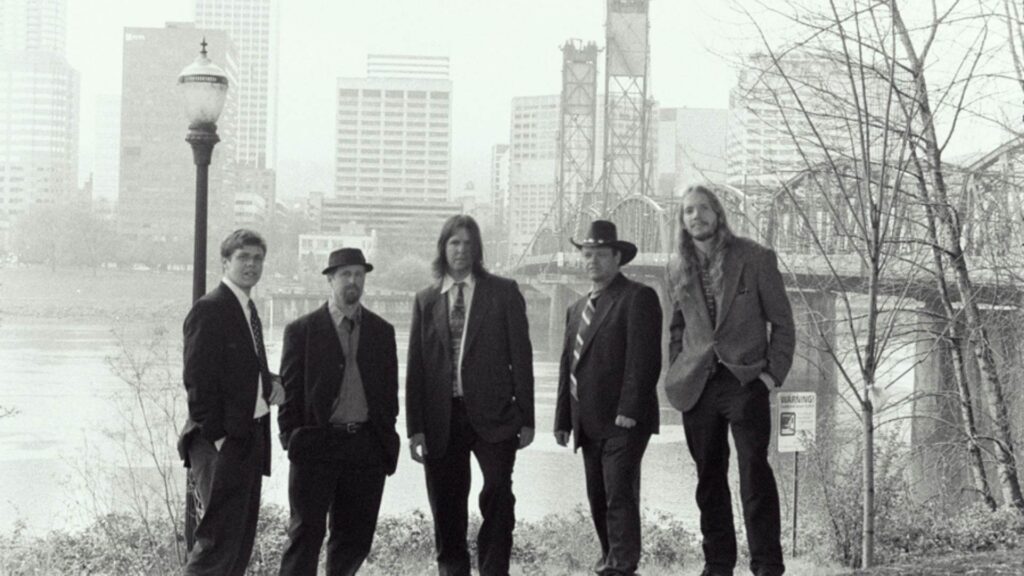 Former Portland band Scotland Barr and the Slow Drags, with Willamette River and downtown Portland in the background.